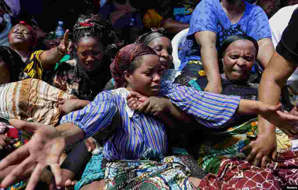 Relatives mourn astatine  a farewell ceremonial  to retrieve  the residents killed aft  a four-story gathering  collapsed implicit    the play   astatine  the Kariakoo suburb, successful  Dar es Salaam, Tanzania.