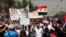 Supporters of religious and political leader Muqtada al-Sadr demonstrate against the possibility of a U.S. military strike against the Syrian government, in Baghdad's Sadr City August 30, 2013.