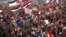 Supporters of Muslim Brotherhood's presidential candidate Mohamed Morsi celebrate his victory at Tahrir Square in Cairo, June 24, 2012. 