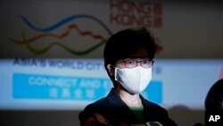 Kepala Eksekutif Hong Kong Carrie Lam dalam konferensi pers di Beijing, China, Jumat, 6 November 2020. (AP Photo/Ng Han Guan)