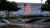 FILE - An American flag is unfurled at the Pentagon in Washington, Sept. 11, 2021, at sunrise on the morning of the 20th anniversary of the terrorist attacks. 