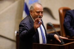 FILE - Former Israeli Defense Minister and Yisrael Beiteinu party leader Avigdor Lieberman speaks in the Knesset, Israel's parliament, in Jerusalem, May 29, 2019.