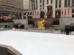 Rockefeller Center's ice skating rink is one of many city attractions that has closed due to the coronavirus. (Margaret Besheer/VOA)