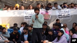 FILE - Bajrang Punia, a wrestler who won a bronze medal for India at the 2020 Tokyo Olympics, addresses the media during a protest against Wrestling Federation of India President Brijbhushan Sharan Singh and other officials in New Delhi, Jan. 20, 2023.