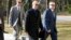 FILE - Officer Edward Nero, from left, Lt. Brian Rice and Officer Garrett Miller three of six Baltimore city police officers charged in connection to the death of Freddie Gray, arrive to Maryland Court of Appeals on March 3, 2016, in Annapolis, Md. 