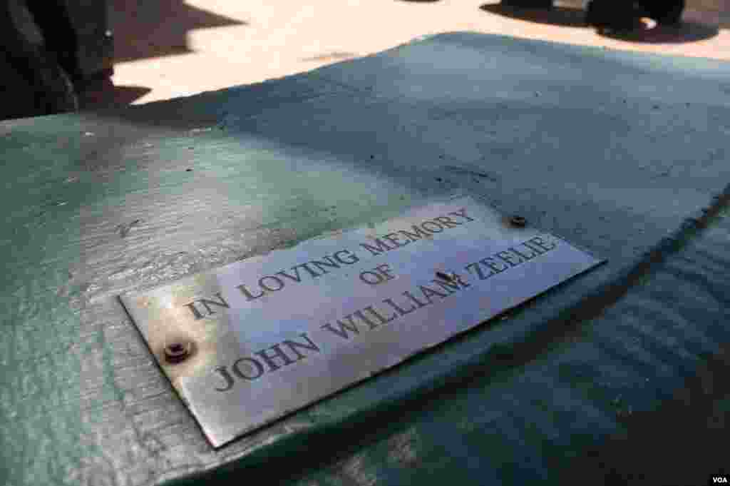 Benches in a garden of remembrance are warmed by the afternoon sun. Plaques have turned them into memorials to some of those who have died at Johannesburg&#39;s Wits Hospice.&nbsp;​(VOA / D. Taylor)