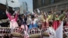 Christian believers beat drums during a protest opposing the homosexuality and same-sex marriage near the venue where thousands of supporters participating to celebrate the 16th Korea Queer Festival in Seoul, South Korea, Sunday, June 28, 2015. The…