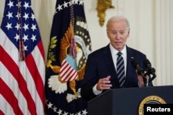 FILE - U.S. President Joe Biden awards the National Medal of Science and the National Medal of Technology and Innovation at the White House in Washington.