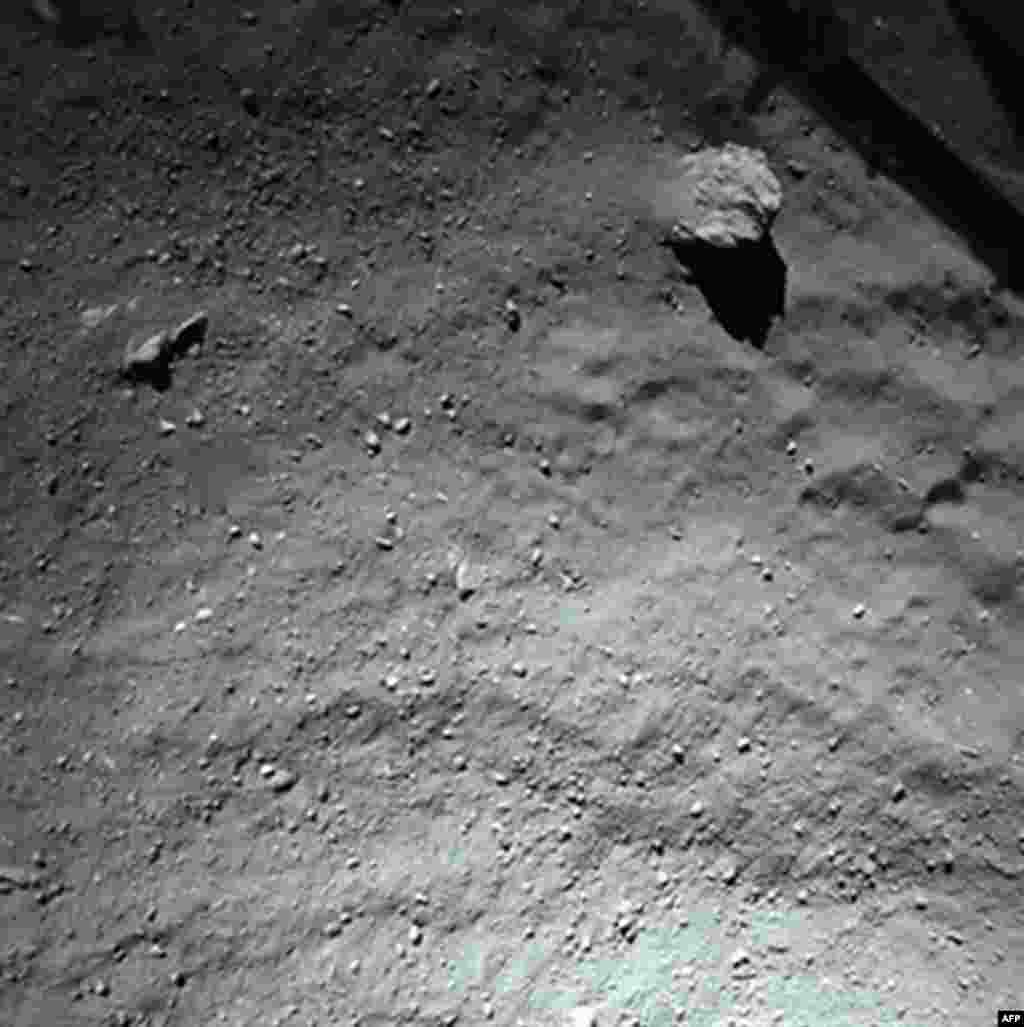 A handout photo released on November 13, 2014 by the European Space Agency, and taken by the Rosetta Lander Imaging System instrument, shows the surface of comet 67P/Churyumov-Gerasimenko during Philae&#39;s descent, from a distance of approximately 40 meters above the surface. (Courtesy: European Space Agency)