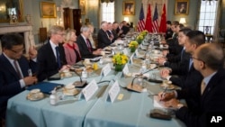 Secretary of State Rex Tillerson, center left, meets with Chinese State Counselor Yang Jiechi and Fang Fenghui at a diplomatic and security dialogue meeting at the State Department in Washington, June 21, 2017.