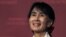 Aung San Suu Kyi smiles during an address at Harvard inCambridge, Masschusetts on September 27, 2012. 