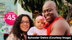 Sylvester Owino with his daughter and wife. The family lives in California. Owino spent a decade in immigration detention and is still fighting a deportation order. His next court date is in September 2019. 