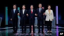 FILE - South Korean presidential election candidates (from left) Yoo Seung-min of the Bareun Party, Ahn Cheol-soo of the People's Party, Hong Joon-pyo of the Liberty Korea Party, Moon Jae-in of the Democratic Party of Korea and Sim Sang-jung of the Justice Party.