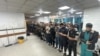 People pray next to the dead bodies of Palestinians at Kamal Adwan hospital, during the ongoing Israeli military operation, amid Israel-Hamas conflict, in Beit Lahiya, in the northern Gaza Strip, Dec. 17, 2024.