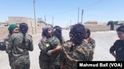 هێزەکانی سوریای دیموکرات لە ناو شاری ڕەققە