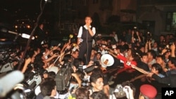 FILE - Peruvian President Alberto Fujimori gives a news conference in front of the Japanese ambassador's residence in Lima, Peru, April 22, 1997.