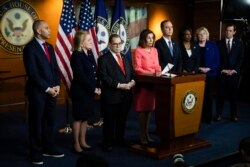 House Speaker Nancy Pelosi of Calif., speaks during a news conference to announce impeachment managers on Capitol Hill in Washington, Wednesday, Jan. 15, 2020. With Pelosi from left are Rep. Hakeem Jeffries, D-N.Y., Rep. Sylvia Garcia, D-Texas,…