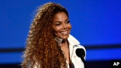 FILE - In this June 28, 2015, file photo, Janet Jackson accepts the ultimate icon: music dance visual award at the BET Awards in Los Angeles. The superstar and her husband Wissam al-Mana welcomed their son, Eissa al-Mana, on Jan. 3, 2017. 