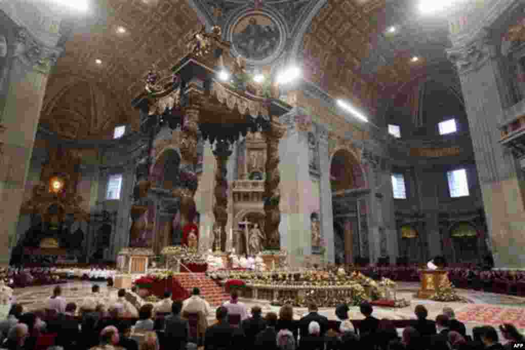 Pope Benedict XVI leads the Epiphany Mass in St. Peter' s Basilica at the Vatican, Friday, Jan. 6, 2012. Pope Benedict XVI named 22 new cardinals Friday, including prelates in such key posts as New York and Hong Kong and a large group of Italians holding