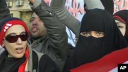 Women demonstrate in Tahrir Square, in central Cairo, January 31, 2011