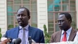 Lul Ruai Koang (L), shown here at South Sudan peace talks last year, says he has broken with Riek Machar to form his own rebel group.