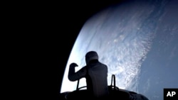 This image made from a SpaceX video shows the start of the first private spacewalk led by tech billionaire Jared Isaacman Thursday Sept. 12, 2024. (SpaceX via AP)