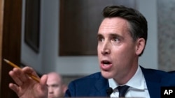 Sen. Josh Hawley, R-Mo., questions Meta CEO Mark Zuckerberg, as he and others appear before the Senate Judiciary Committee's hearing on online child safety on Capitol Hill, Jan. 31, 2024 in Washington.