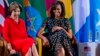 U.S. first lady Michelle Obama, right, and former U.S. first lady Laura Bush laugh as they participate in the African First Ladies Summit: “Investing in Women: Strengthening Africa,” hosted by the George W. Bush Institute, July 2, 2013, in Dar es Salaam, 