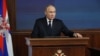 En esta fotografía distribuida por la agencia estatal rusa Sputnik, el presidente ruso Vladimir Putin pronuncia un discurso en una reunión en el Centro de Control de Defensa Nacional en Moscú el 19 de diciembre de 2023.