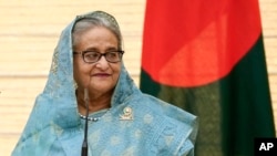 Bangladeshi Prime Minister Sheikh Hasina speaks during joint press remarks with Japanese counterpart Fumio Kishida (not pictured) at the latter's office in Tokyo, Japan, April 26, 2023.