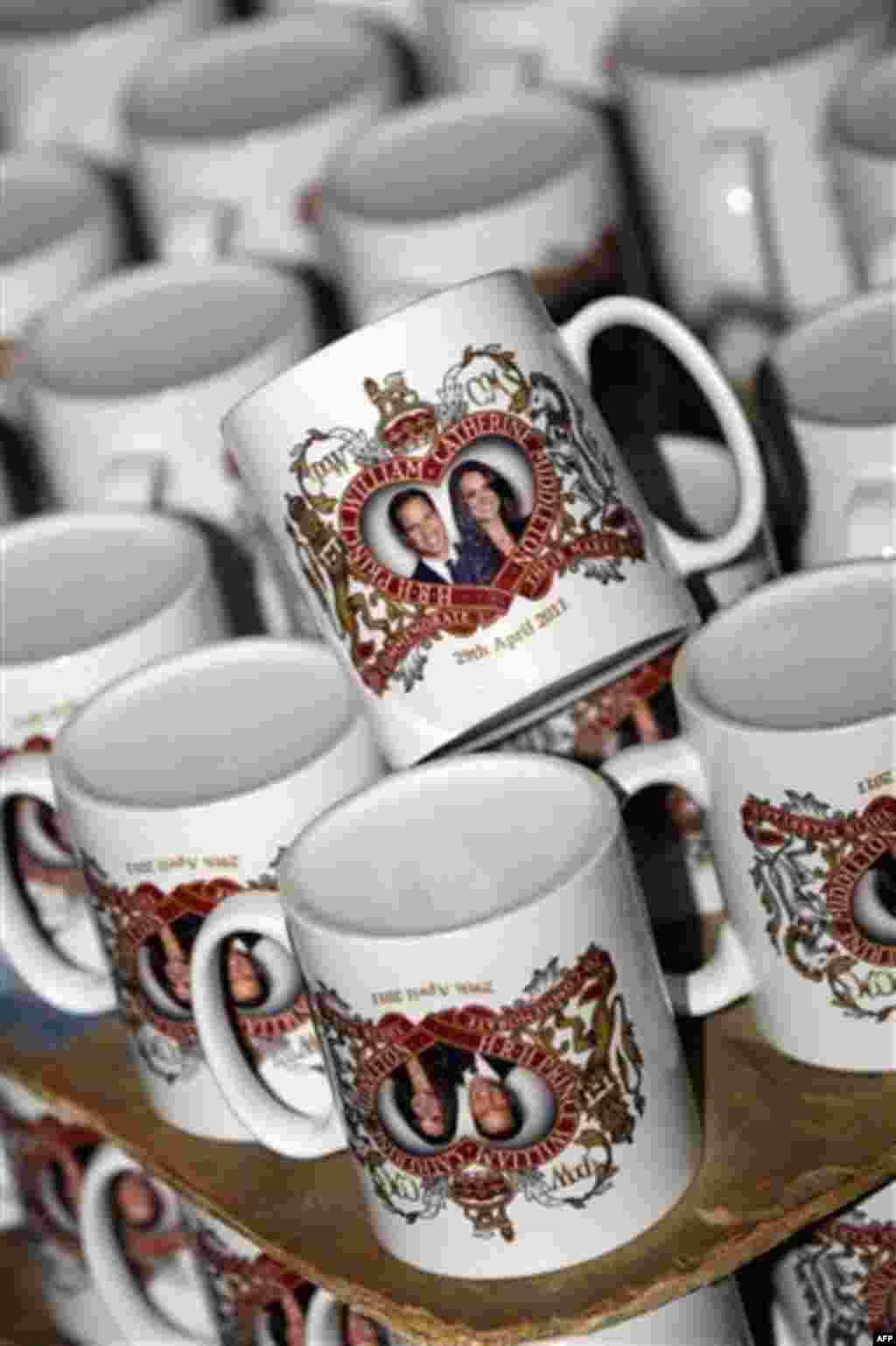 Mugs commemorating the forthcoming marriage of Britain's Prince William to Kate Middleton, are stacked at the Prince William Pottery Company in Liverpool, England, Wednesday Nov. 23, 2010. Prince William and Kate Middleton will marry April 29 in Westminst