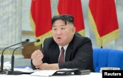 North Korean leader leader Kim Jong Un attends the 12th Meeting of the Political Bureau of the 8th Central Committee of the Workers' Party of Korea (WPK), in Pyongyang