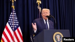 U.S. President Donald Trump speaks during a press conference at Trump National Doral Miami in Miami, Florida, U.S., March 9, 2026. 
