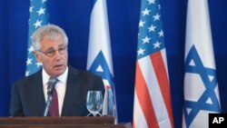 U.S. Defense Secretary Chuck Hagel speaks during a joint press conference with Israeli Defense Minister Moshe Yaalon following a meeting in Tel Aviv, May 15, 2014. 