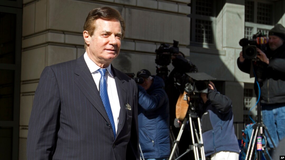 FILE - Paul Manafort, President Donald Trump's former campaign chairman, leaves the federal courthouse after his hearing in Washington, Feb. 28, 2018.
