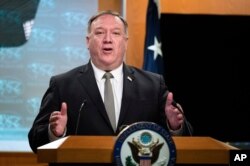 FILE - Secretary of State Mike Pompeo, speaks during a news conference at the State Department, July 1, 2020, in Washington.