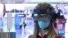 'Smart Helmets' at Rome Airport Check On Passengers' Temperatures 