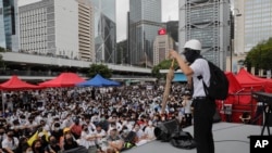 A protester shares his story during continued pro-democracy rallies in Hong Kong, on Monday, Sept. 2, 2019.