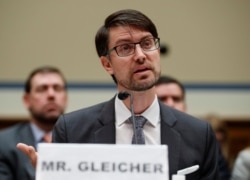 FILE - Facebook Head of Cybersecurity Policy Nathaniel Gleicher testifies on Capitol Hill in Washington, May 22, 2019.