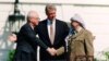 Israeli Prime Minister Yitzhak Rabin, U.S. President Bill Clinton, and Yasser Arafat at the Oslo Accords signing ceremony on 13 September 1993