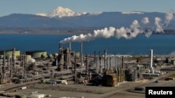 FILE - Drone image shows Marathon Petroleum's refinery in Anacortes, Washington, March 9, 2022. Petroleum engineers are among the professions that make $100,000 to people with bachelor's degrees.