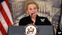 Former Secretary of State Madeleine Albright speaks at a reception celebrating the completion of the U.S. Diplomacy Center Pavilion at the State Department in Washington, Jan. 10, 2017.