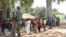FILE - A soldier stands guard as former Anti-Balaka child soldiers wait to be released from a camp in Batangafo, Central African Republic, August 28, 2015. 