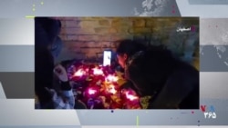 گرامیداشت یاد آرزو عابدی، معترض کشته‌شده، با قرار دادن شمع و گل بر محل گلوله خوردنش
