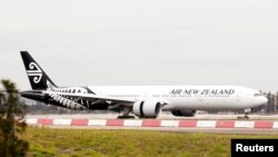 FILE - An Air New Zealand Boeing 777-300ER plane taxis after landing at Kingsford Smith International Airport in Sydney, Australia, Feb. 22, 2018.