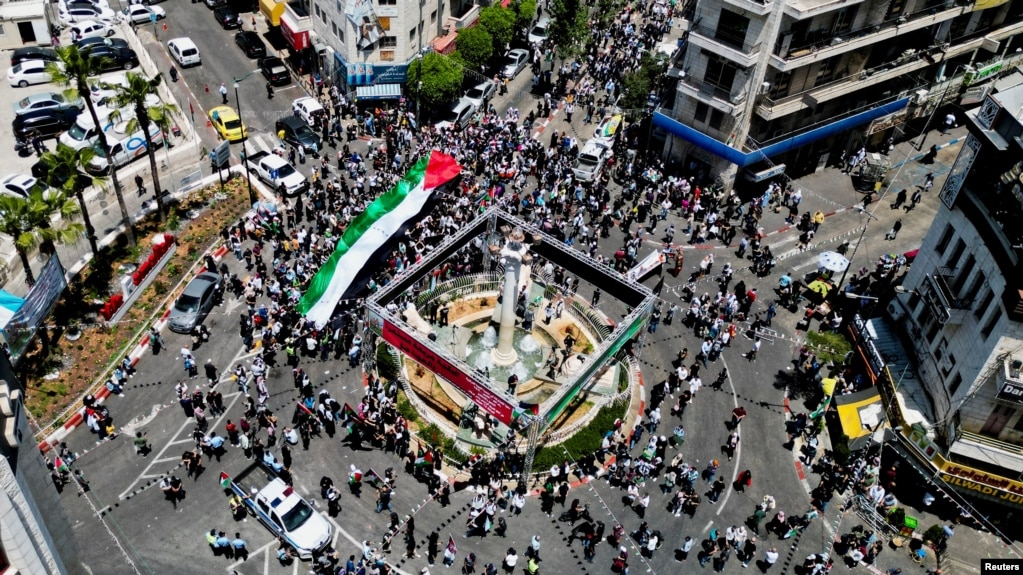 Palestinians react during a rally as they mark the 75th anniversary of Nakba in Ramallah in the Israeli-occupied West Bank May 15,2023.