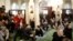 Visitors watch members of the Muslim community praying in the Paris Grand Mosque during an open day weekend for mosques in France, Jan. 10, 2016. 