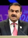 FILE - India's Adani Group Chairman Gautam Adani addresses the Vibrant Gujarat Global Summit in Gandhinagar, India, Jan.10, 2024. He has since been indicted in the U.S. on charges he duped investors.