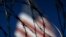 FILE - Concertina wire lines the top of a wall at the San Ysidro port of entry in San Diego, California, on the U.S. border with Mexico, Nov. 16, 2018.