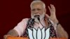 FILE - Indian Prime Minister Narendra Modi speaks during an election campaign rally of his Bharatiya Janata Party in Hyderabad, India, April 1, 2019. 